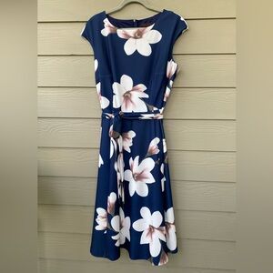 Navy and floral cap dress with tie belt. Size 2XL never worn